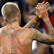 Quizá los tatuajes más llamativos sean los que luce en su espalda y su cuello Quizá los tatuajes más llamativos sean los que luce en su espalda y su cuello